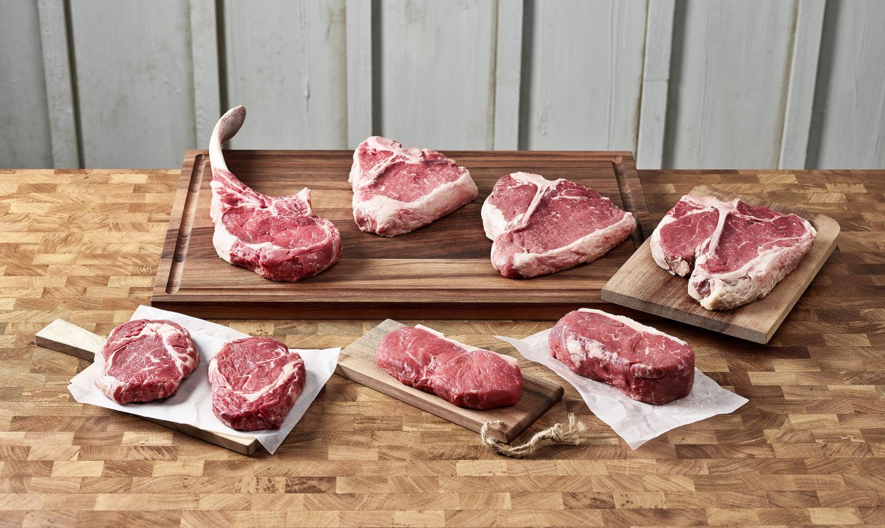 Fleischstücke Tomahawk, T-Bone Steak, Porterhouse, Entrecote, Ripeye, Hohrücken