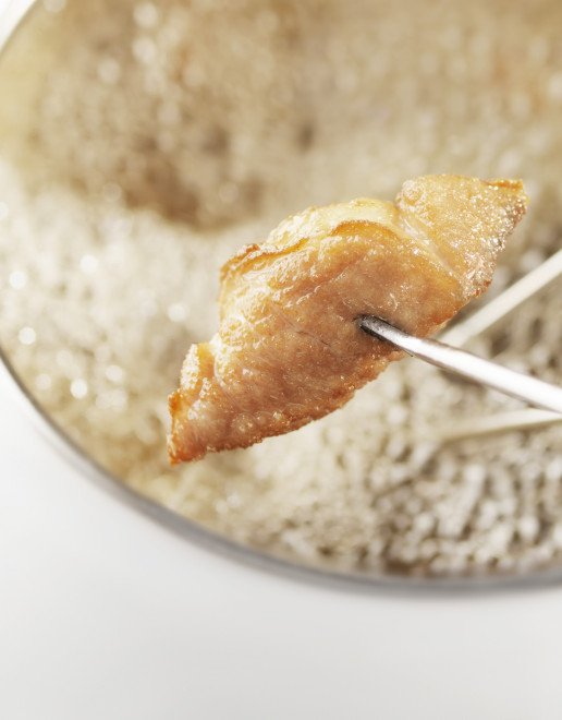 Thai-Fondue mit Pouletschenkeln und Curry-Dip
