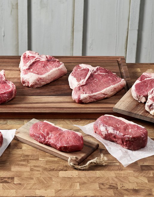 Fleischstücke Tomahawk, T-Bone Steak, Porterhouse, Entrecote, Ripeye, Hohrücken